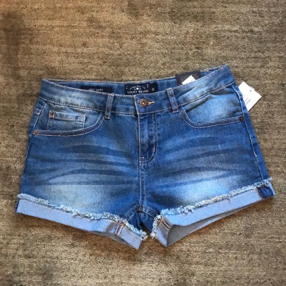 Girl’s Lucky Brand frayed hemmed Riley ADA washed jean button shorts